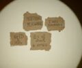 Cardboard signs convey job loss and economic crisis message, ideal for articles on unemployment.